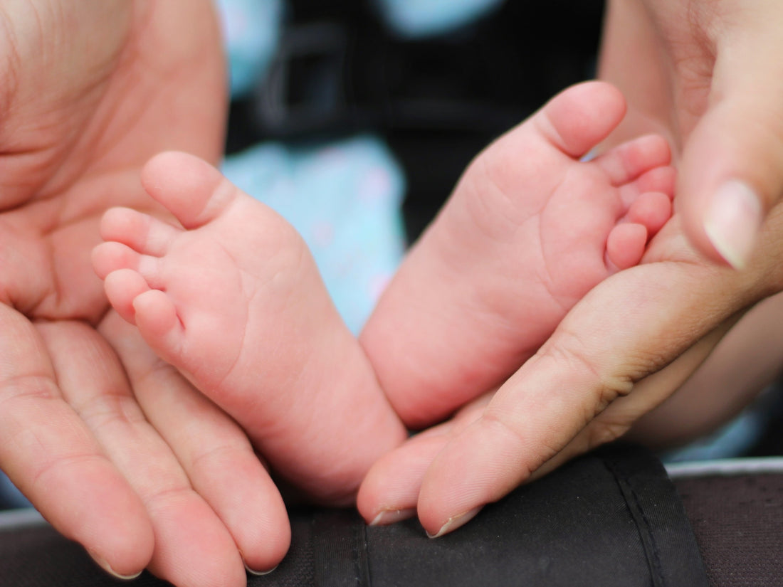 Picture of midwife cradling baby's feet